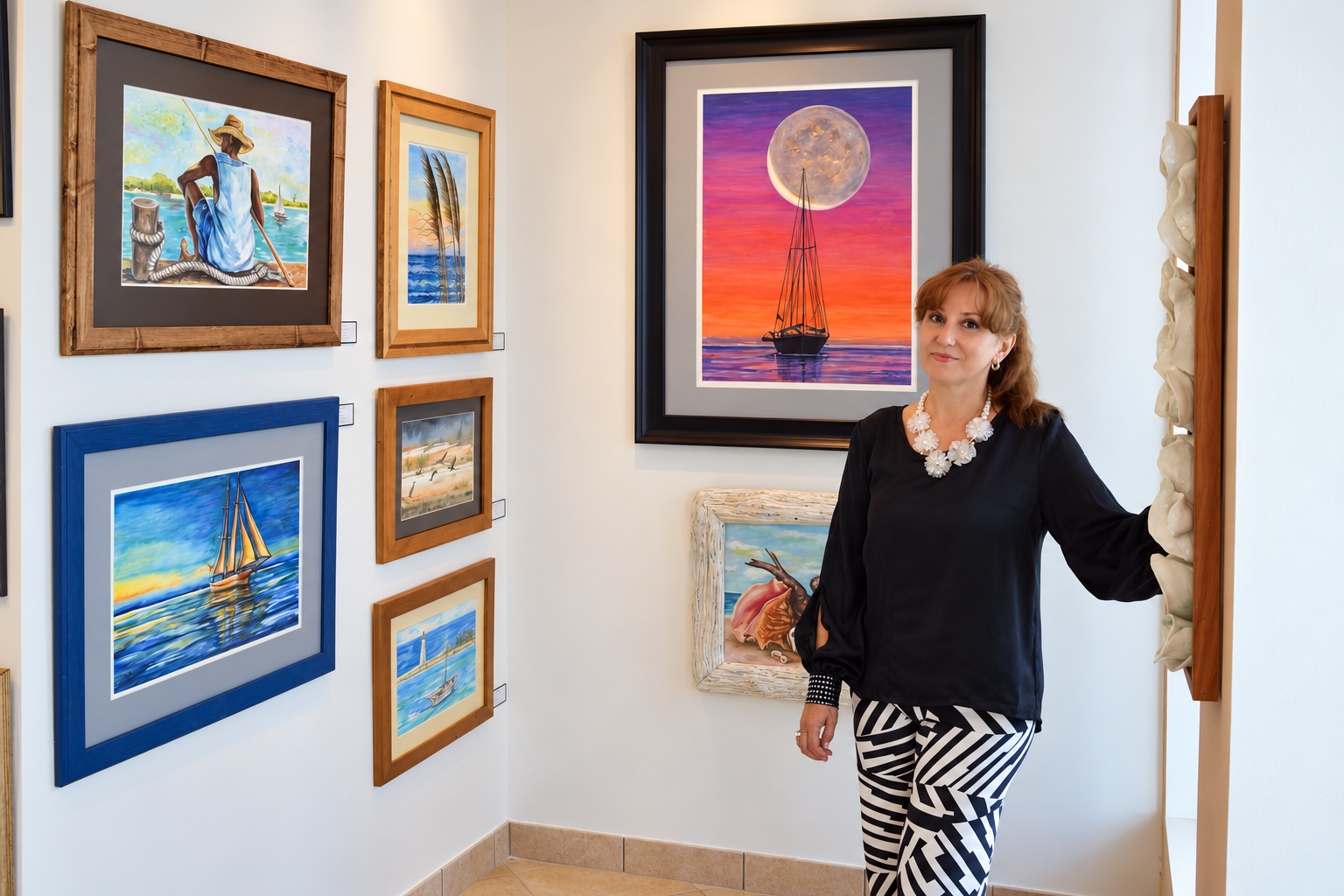 Katerina Kovatcheva surrounded by her framed paintings in the gallery
